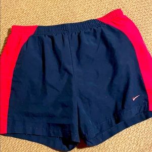 Blue Nike running shorts
